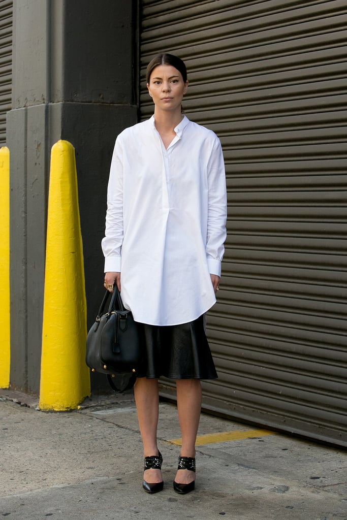 A basic white button-down is our go-to year-round; just make it feel easy with a midiskirt and heels for an effortless office ensemble.