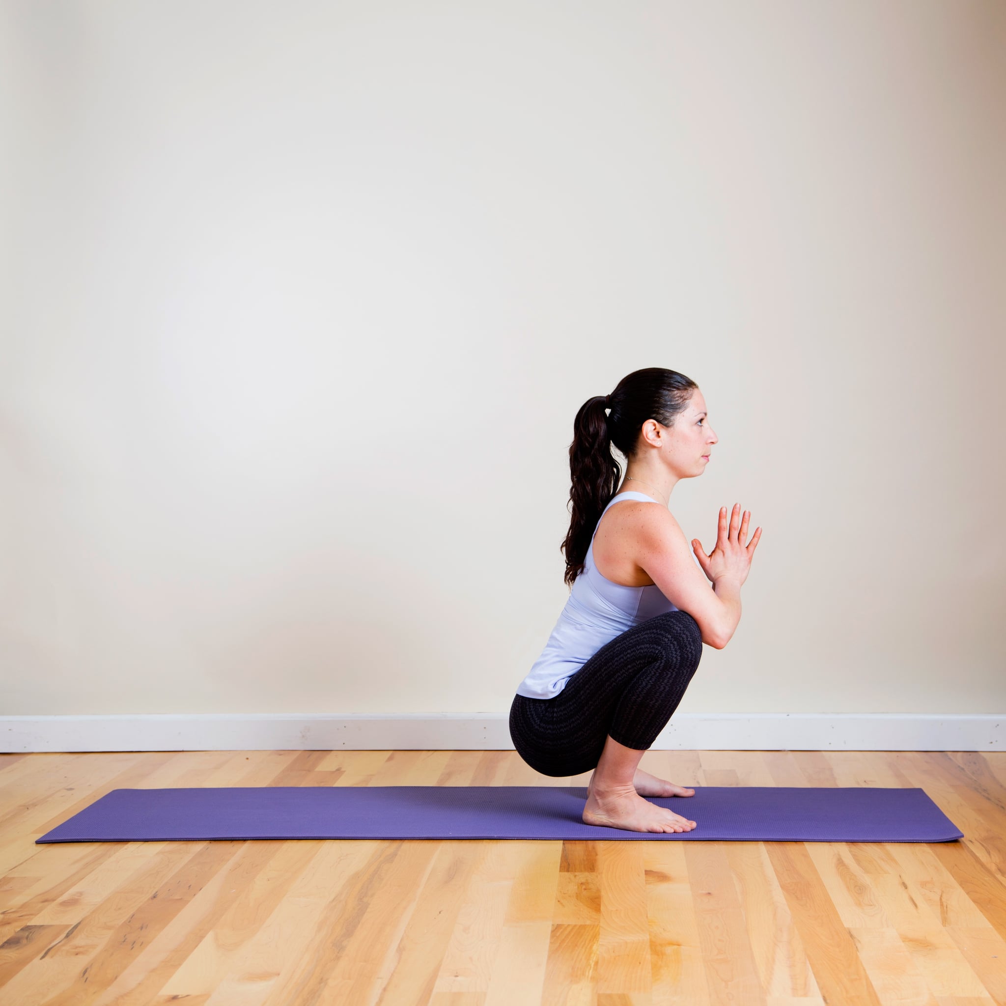 Extended Leg Squat Pose (Utthita Malasana) Instructions & Photos • Yoga  Basics