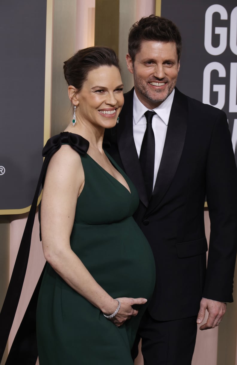 BEVERLY HILLS, CALIFORNIA - JANUARY 10: (L-R) Hilary Swank and Philip Schneider attendthe 80th Annual Golden Globe Awards at The Beverly Hilton on January 10, 2023 in Beverly Hills, California. (Photo by Frazer Harrison/WireImage)