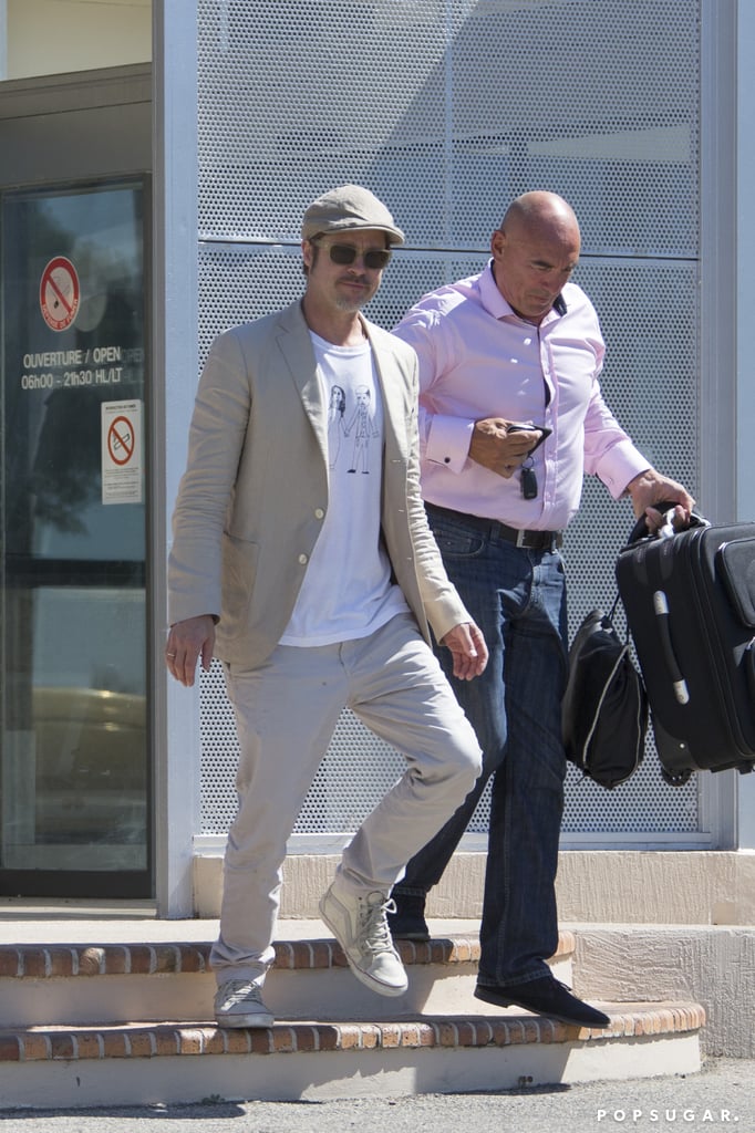 Brad Pitt Wears Homemade Shirt at Airport in France | Photos