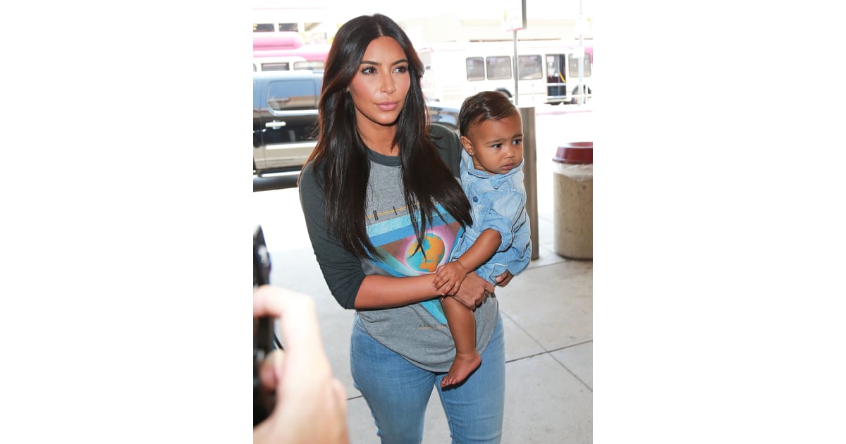 Kim Kardashian Carrying North West in LAX | Photos | POPSUGAR Celebrity