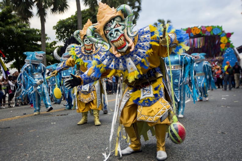 Revelers parade along the Malecon avenue in Santo Domingo during Carnival celebrations on March 4, 2018.   / AFP PHOTO / Erika SANTELICES        (Photo credit should read ERIKA SANTELICES/AFP via Getty Images)