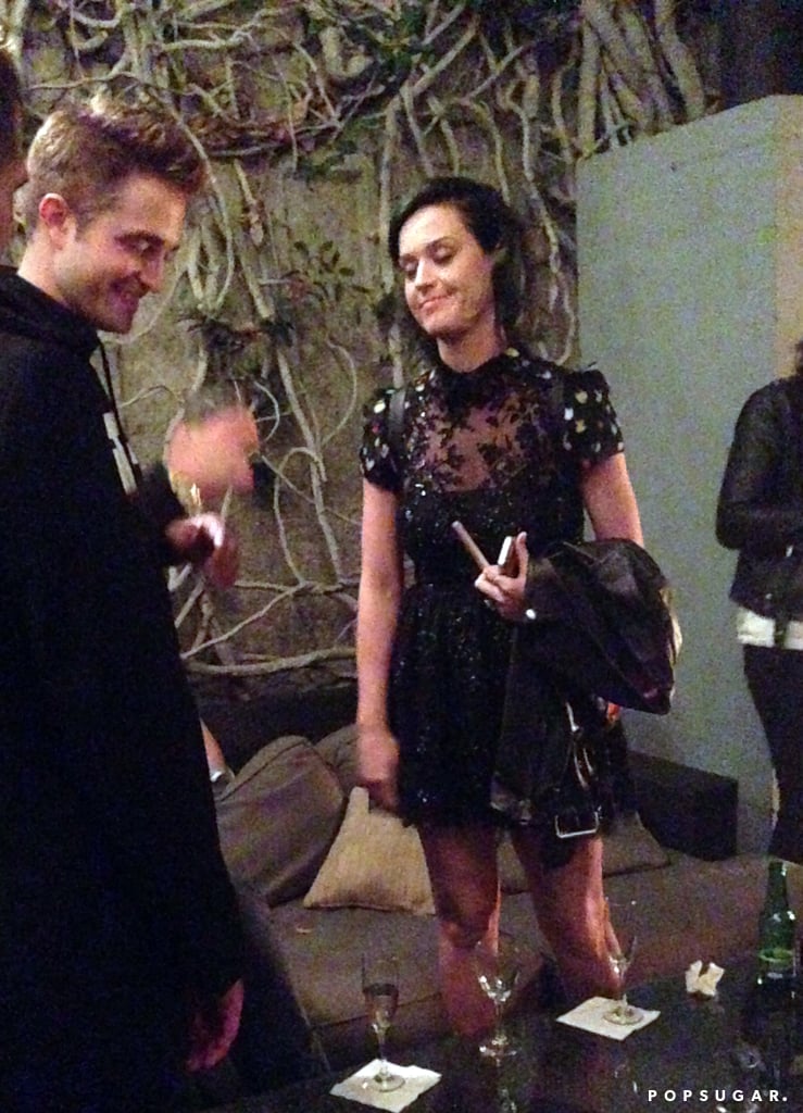 Katy and Rob shared a laugh at the afterparty for Rob's movie The Rover in LA in 2014.
