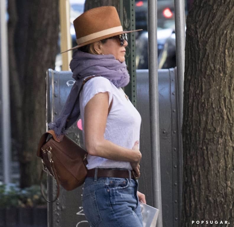 Jennifer Aniston with brown leather Chloe backpack in New York on October 1  ~ I want her style - What celebrities wore and where to buy it. Celebrity  Style