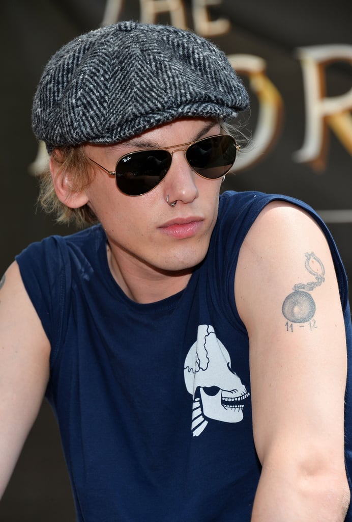 Jamie Campbell Bower's Ball and Chain Tattoo