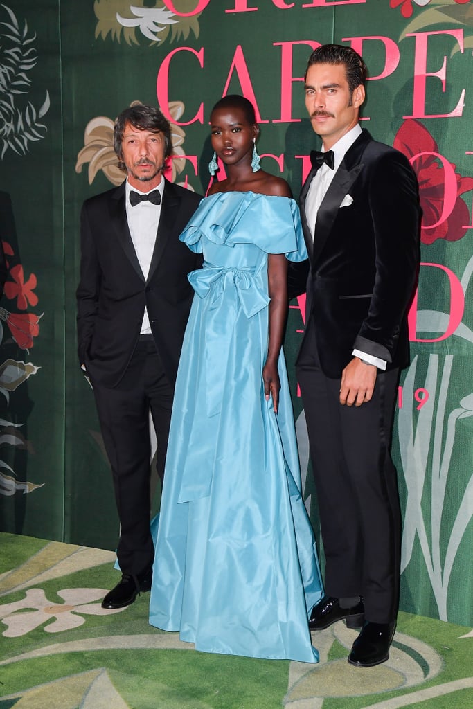 Pierpaolo Piccioli, Adut Akech, and Jon Kortajarena at The Green Carpet Fashion Awards 2019