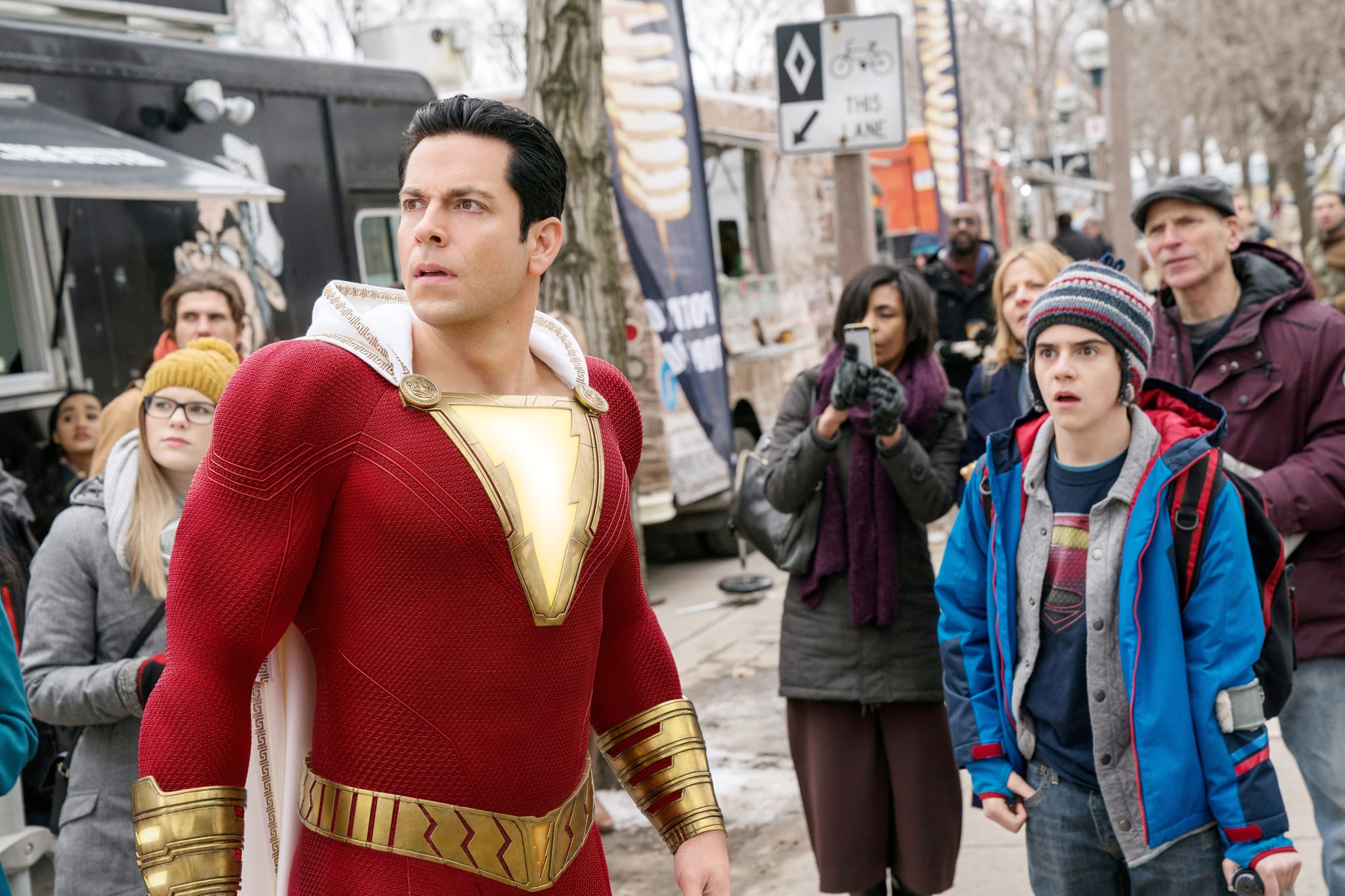 SHAZAM!, from left: Zachary Levi (as Shazam), Jack Dylan Grazer, on-set, 2019. ph: Steve Wilkie /  Warner Brothers / Courtesy Everett Collection