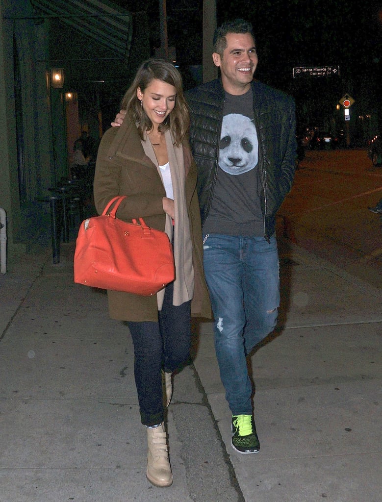 Cash Warren took his trendsetting lady — layered up in a cozy merino wool Inhabit cardigan, olive coat, and cuffed denim — out for a casual West Hollywood dinner. Alba completed her killer street style with neutral leather boots and a bold Tory Burch tote.