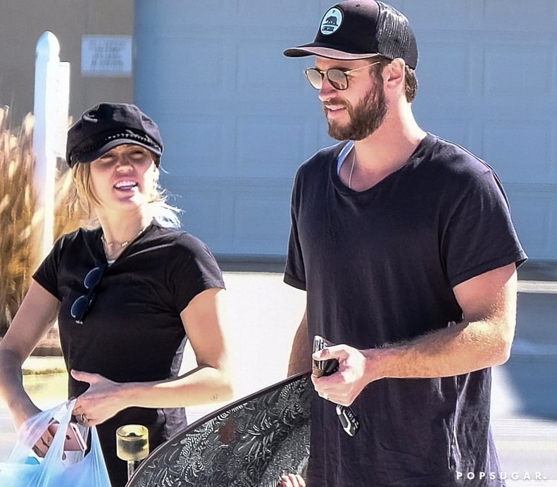 Miley Cyrus and Liam Hemsworth Were Spotted Wearing Shiny New Accessories