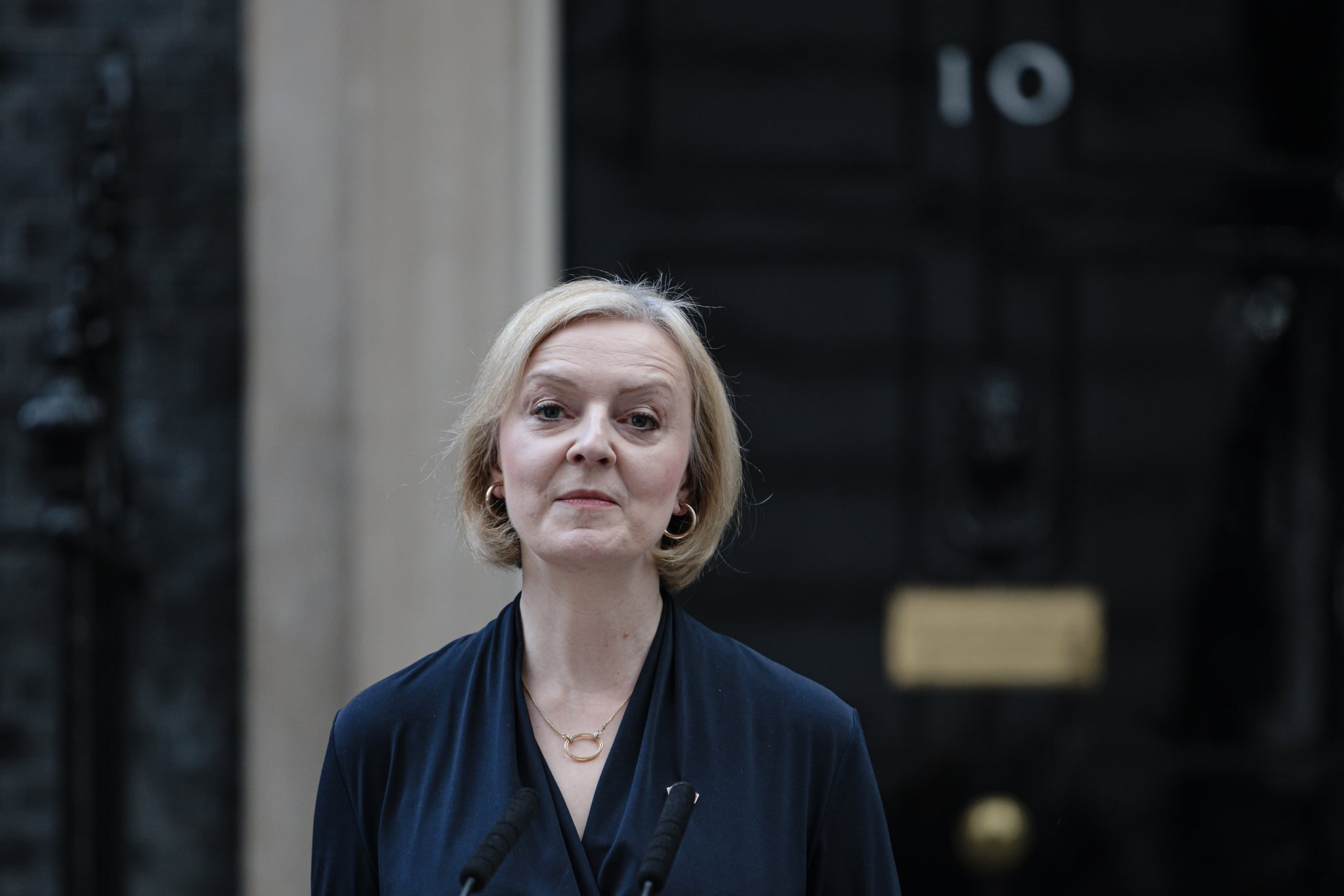 LONDON, ENGLAND - OCTOBER 20: Prime Minister Liz Truss delivers her resignation speech at Downing Street on October 20, 2022 in London, England. Liz Truss has been the UK Prime Minister for just 44 days and has had a tumultuous time in office. Her mini-budget saw the GBP fall to its lowest-ever level against the dollar, increasing mortgage interest rates and deepening the cost-of-living crisis. She responded by sacking her Chancellor Kwasi Kwarteng, whose replacement announced a near total reversal of the previous policies. Yesterday saw the departure of Home Secretary Suella Braverman and a chaotic vote in the House of Commons chamber. (Photo by Rob Pinney/Getty Images)