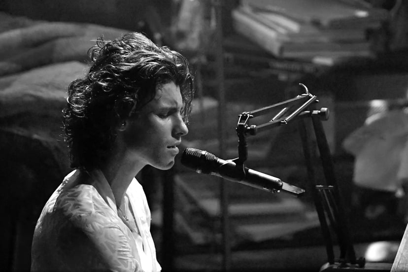 LOS ANGELES, CALIFORNIA - NOVEMBER 22: (EDITORS NOTE: Image has been converted to black and white. A colour version is available.) In this image released on November 22, Shawn Mendes performs onstage for the 2020 American Music Awards at Microsoft Theatre