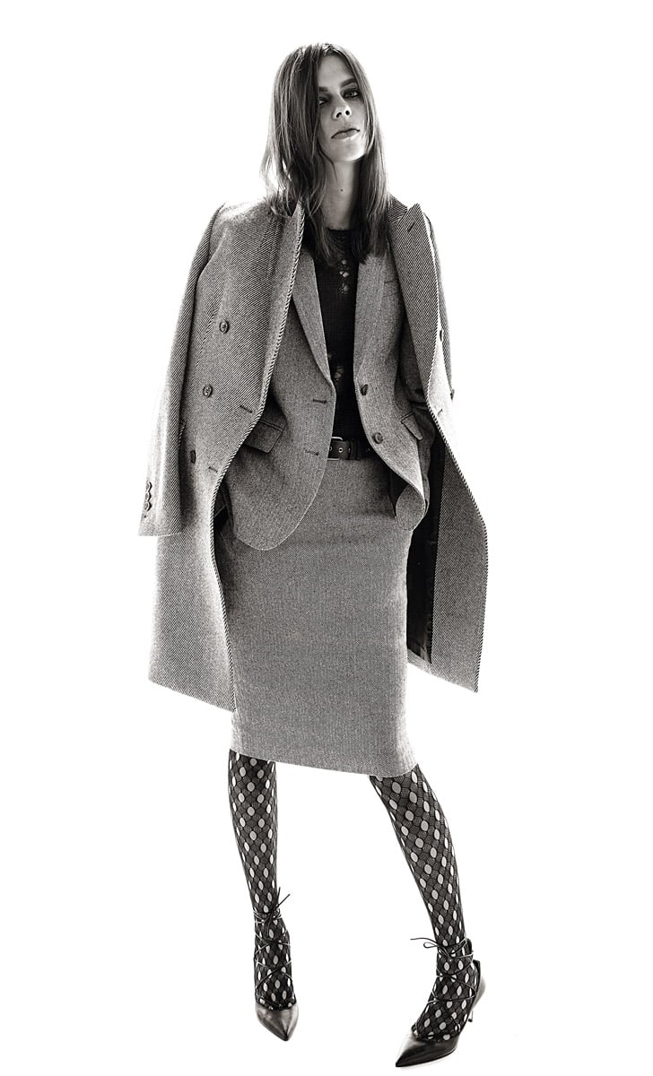 A matching three-piece wool suit: coat, blazer, and skirt