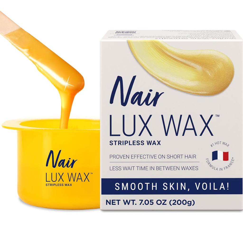 Nair Lux Wax ($9, originally $13)
Raise your hand if you've been personally victimized by professional wax appointments. This Popsugar Beauty award-winning at-home wax gives you the same results without the awkward in-person experience. The liquid gold formula binds to every little hair and removes it from the root for a smooth finish that lasts.
