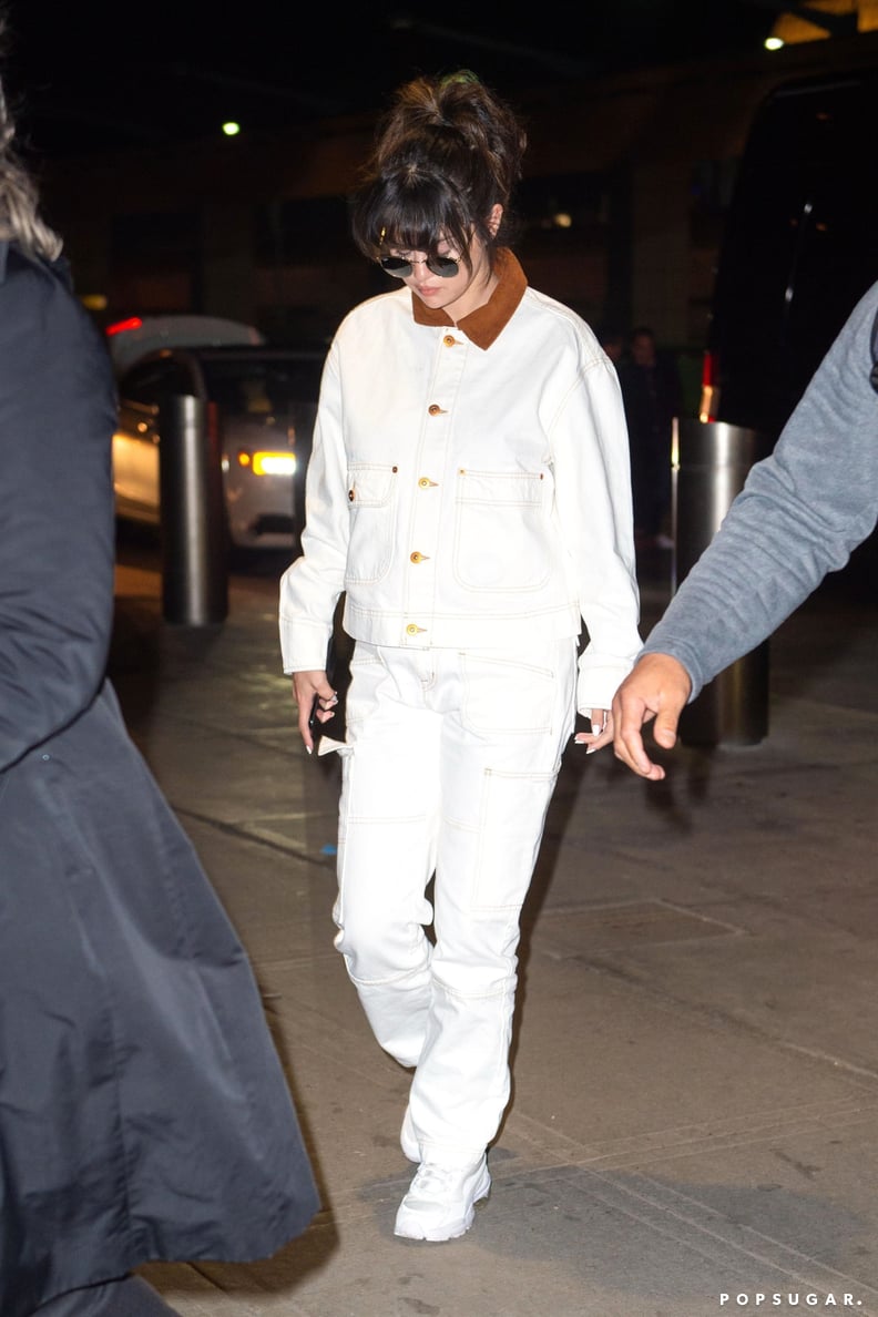 Selena Gomez Wearing a White Denim Outfit at JFK in NYC