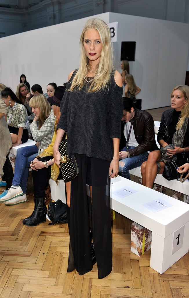 Poppy Delevingne channeled a moody look in a sheer, split maxi, charcoal knit, and a dark burgundy lip at Sass & Bide.
Poppy Delevingne channeled a moody look in a sheer, split maxi, charcoal knit, and a dark burgundy lip at Sass & Bide.