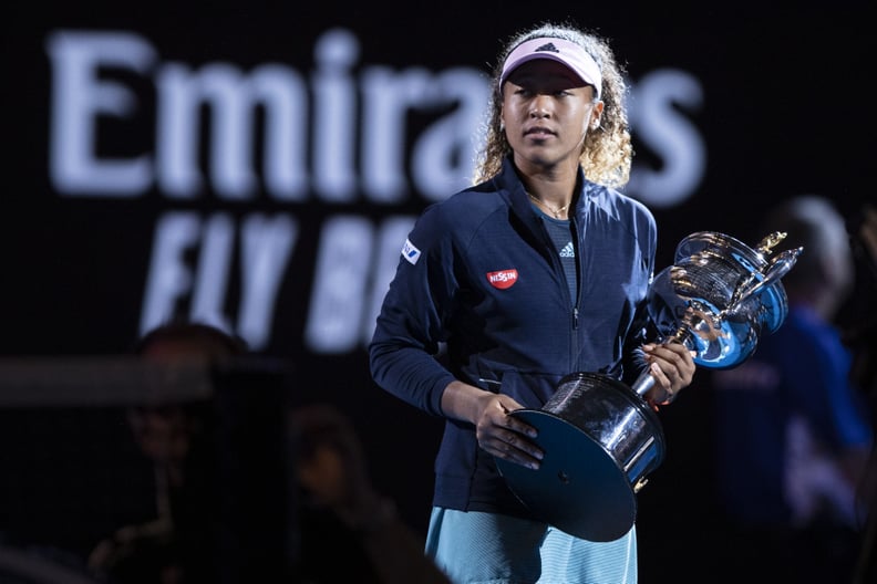 MELBOURNE, AUSTRALIA - JANUARY 26:  Naomi Osaka of Japan poses for a photo with the Daphne Akhurst Memorial Cup following victory in her Women's Singles Final match against Petra Kvitova of the Czech Republic during day 13 of the 2019 Australian Open at M