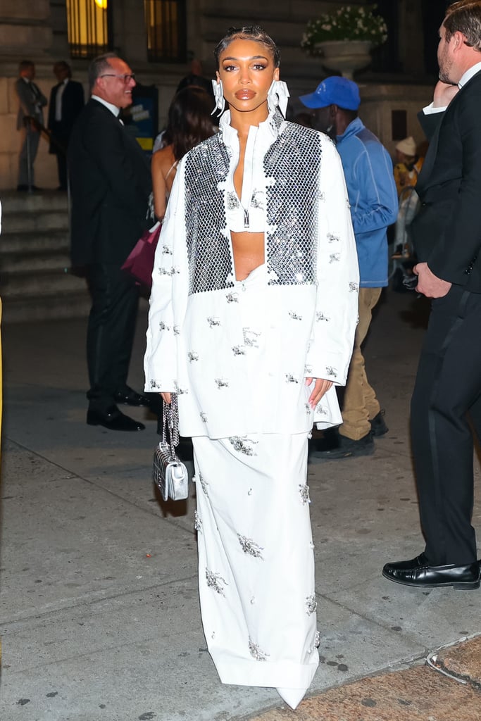 Lori Harvey's Crystal Coat and Maxi Skirt | Photos