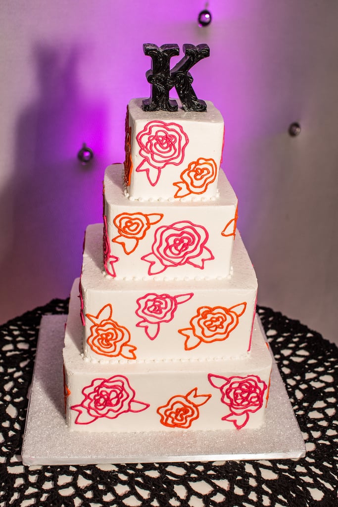 Don't the floral embellishments of this darling cake remind you of a textile? Not your grandma's curtains, though — with its vibrant colors, this is ultrachic.