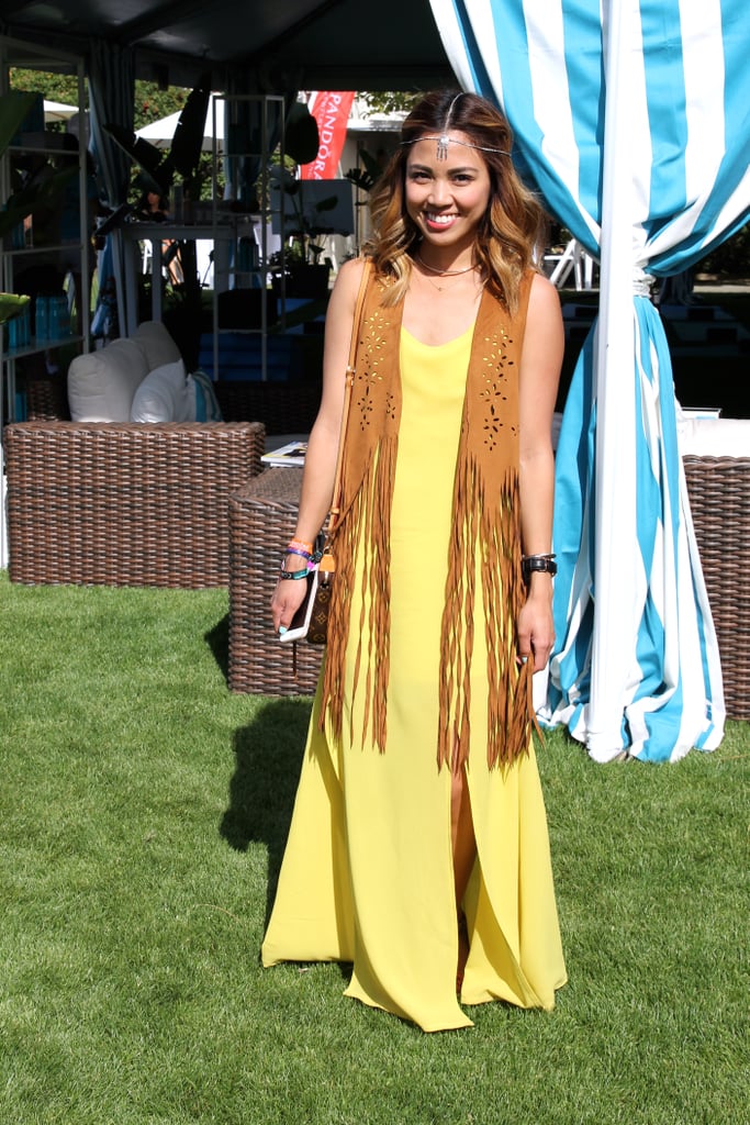 This amazing Forever 21 headpiece set just the right tone for a bohemian queen. We love how this fringe vest layers atop a yellow maxi dress, complete with a leg slit.