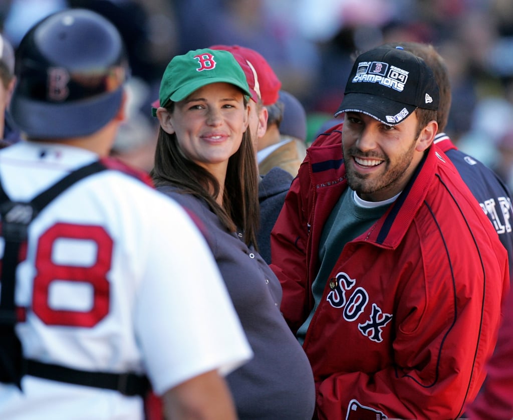 The couple chatted with a Boston Red Sox player during an October 2005 game in Boston.