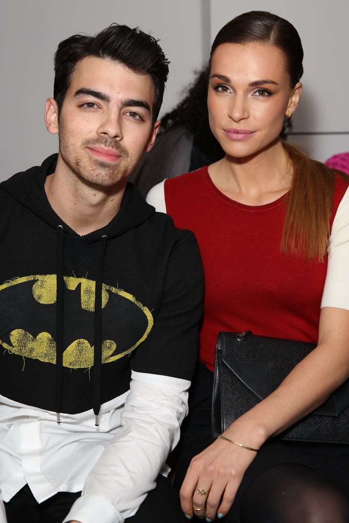 Joe Jonas showed his love for Batman at The Blonds fashion show with girlfriend Blanda Eggenschwiler on Wednesday.
