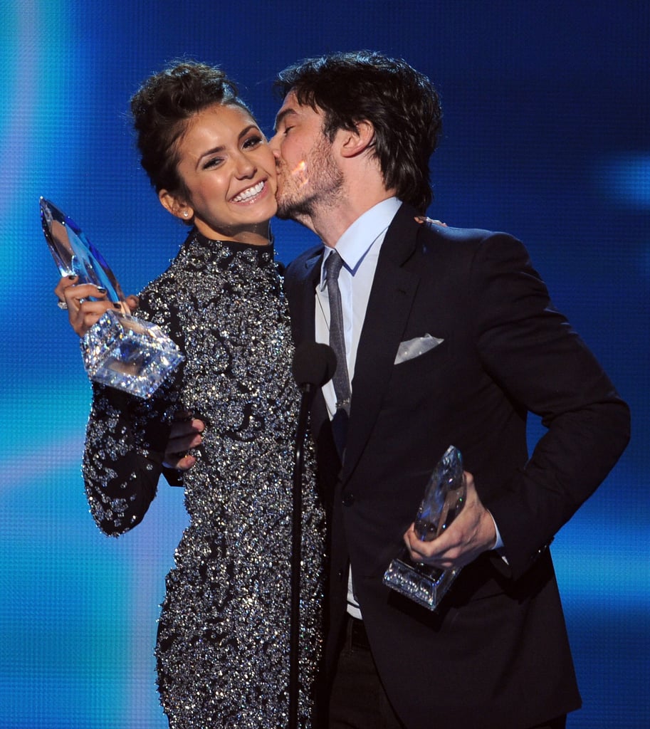 Nina Dobrev got a kiss from ex-boyfriend Ian Somerhalder at the People's Choice Awards in LA on Wednesday. The onscreen couple won favorite TV chemistry.