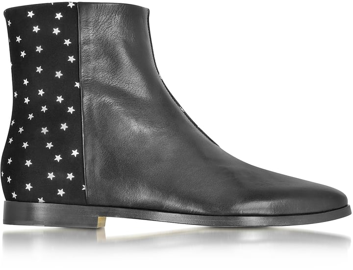 Finish off any look with these Zoe Lee Creola Leather and Suede Boots With Silver Stars ($715).