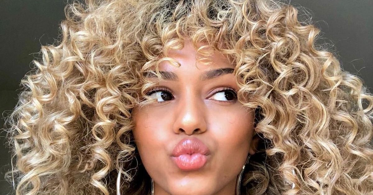 3. 10 Gorgeous Curly Hair Styles with Blonde Highlights - wide 5