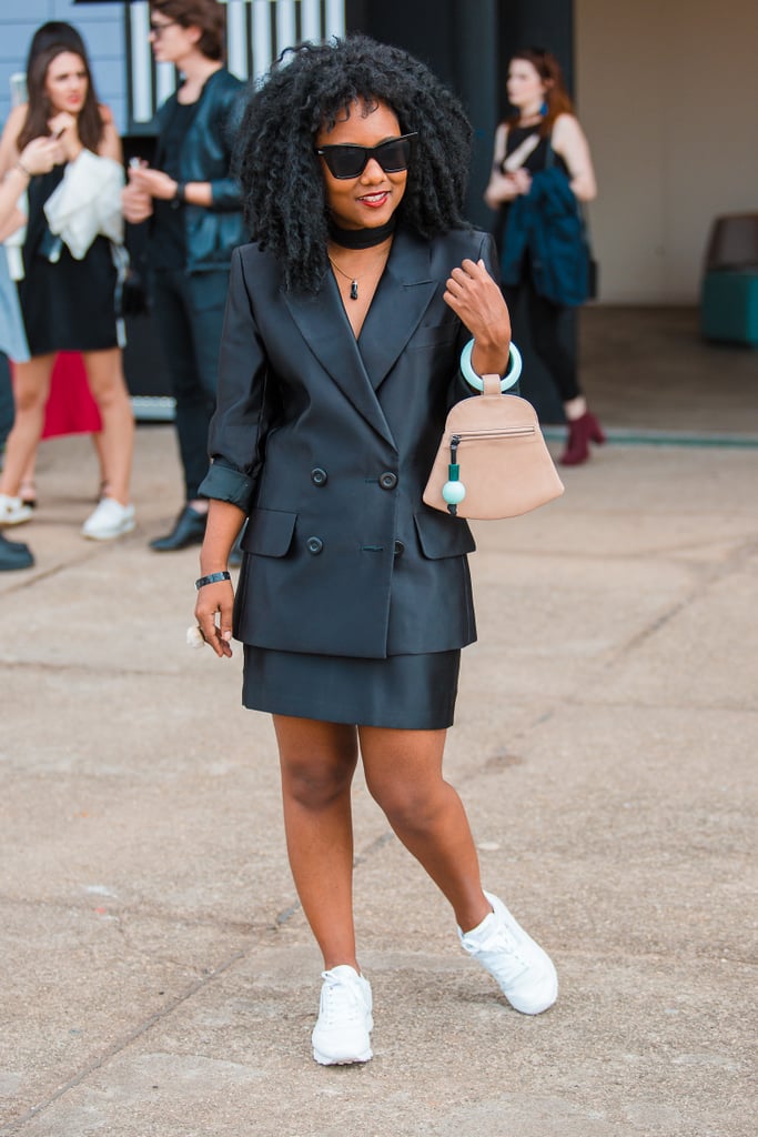 suit with white trainers