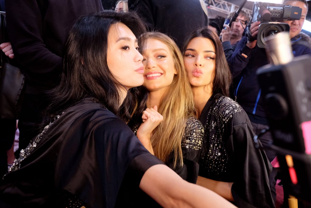 Pictured: Ming Xi, Gigi Hadid, and Kendall Jenner