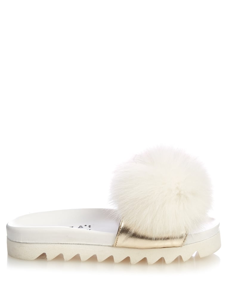 Joshua Sanders Fur-pompom platform slides ($354)