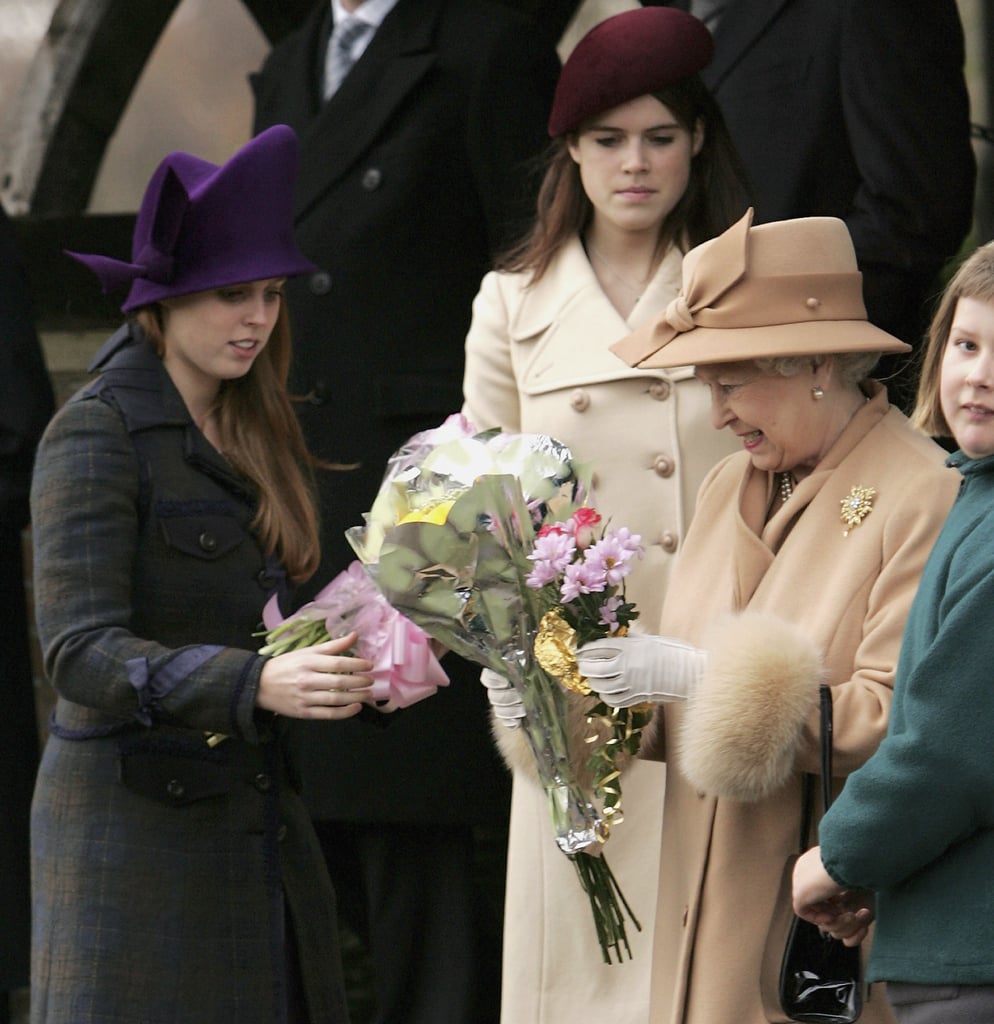 Princess Beatrice and Princess Eugenie are often seen helping the queen carry her flowers.