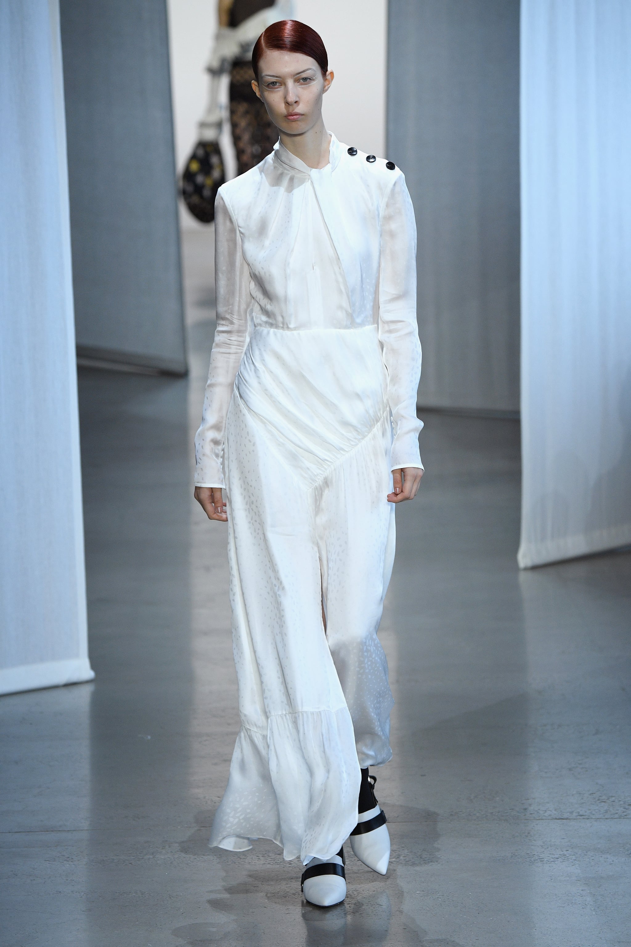 Kate who s always seemed to favour white dresses for formal