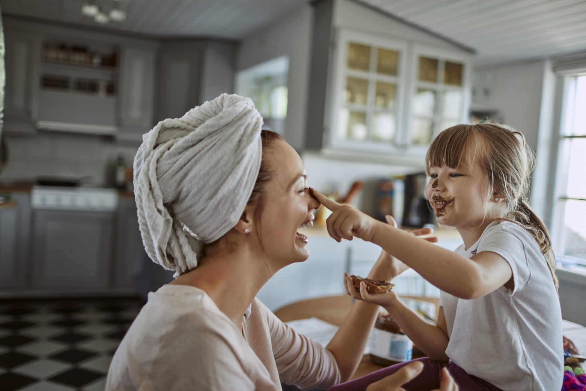 Close up of a mother and daughter having breakfast