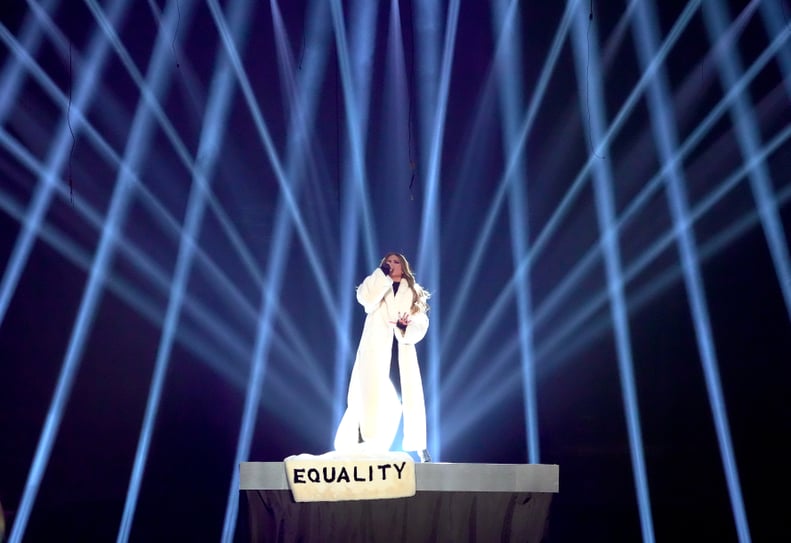 J Lo's Adrienne Landau "EQUALITY" Coat at the iHeartRadio Music Awards