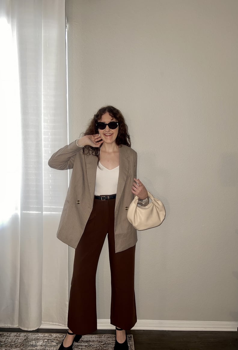 woman posing in the abercrombie a&f sloane tailored pants