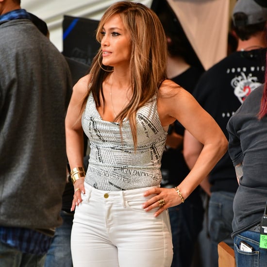 Jennifer Lopez in Newspaper Top and White Jeans on Set 2019