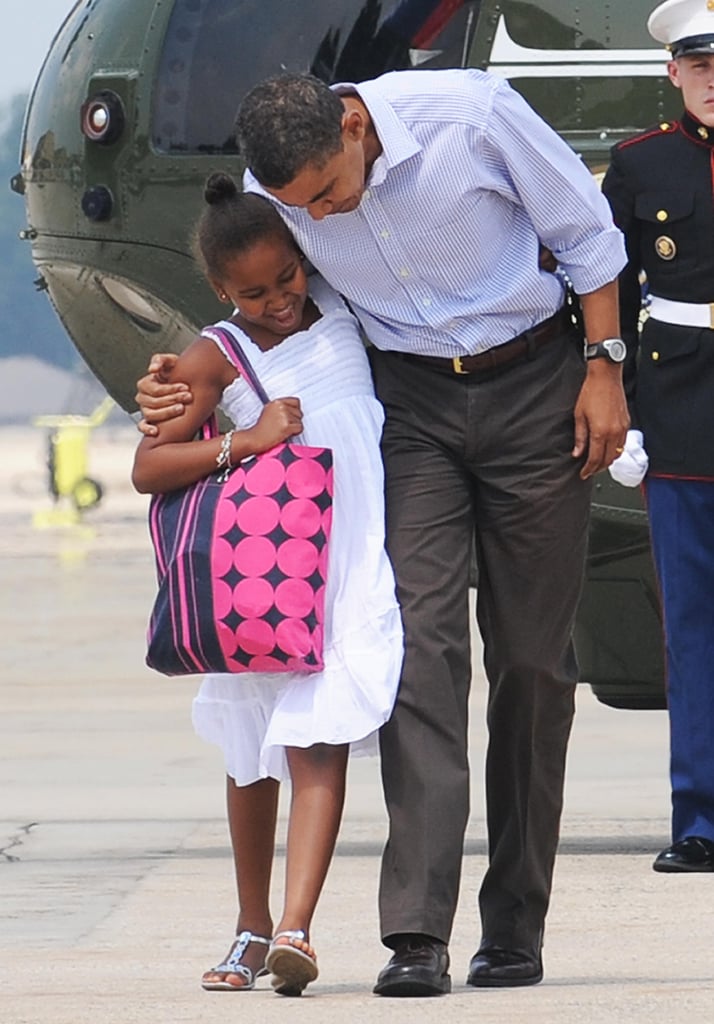 Barack boarded Air Force One with Sasha before flying to Martha's Vineyard in August 2009.