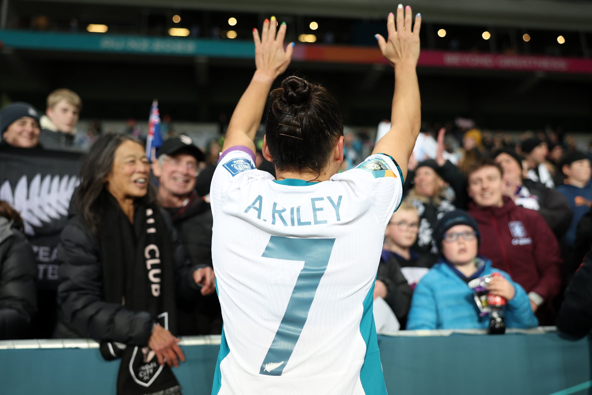 DUNEDIN, NEW ZEALAND - JULY 30: Captain Ali Riley of New Zealand applauds fans after the scoreless draw confirming the elimination from the tournament following the FIFA Women's World Cup Australia & New Zealand 2023 Group A match between Switzerland and New Zealand at Dunedin Stadium on July 30, 2023 in Dunedin / Ōtepoti, New Zealand. (Photo by Matthew Lewis - FIFA/FIFA via Getty Images)