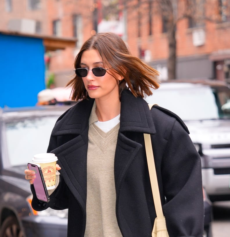 Hailey Bieber Wears Miniskirt and Loafers in NYC, Photos