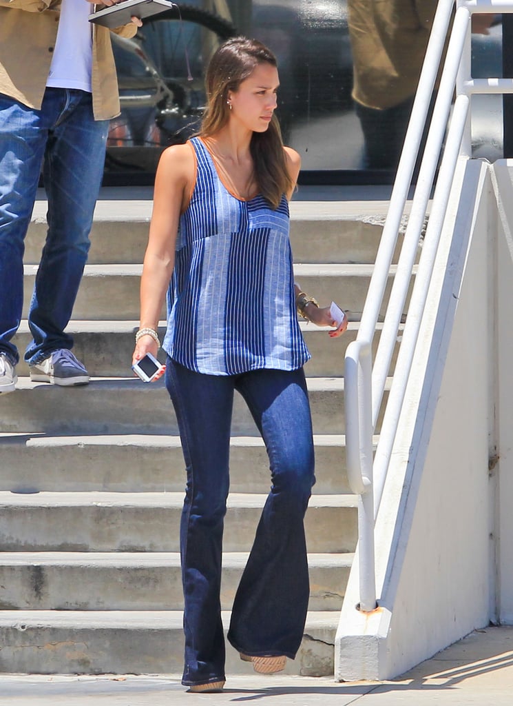 Jessica stuck with a blue color palette, pairing her wide-leg denim with a patchwork tank in LA.