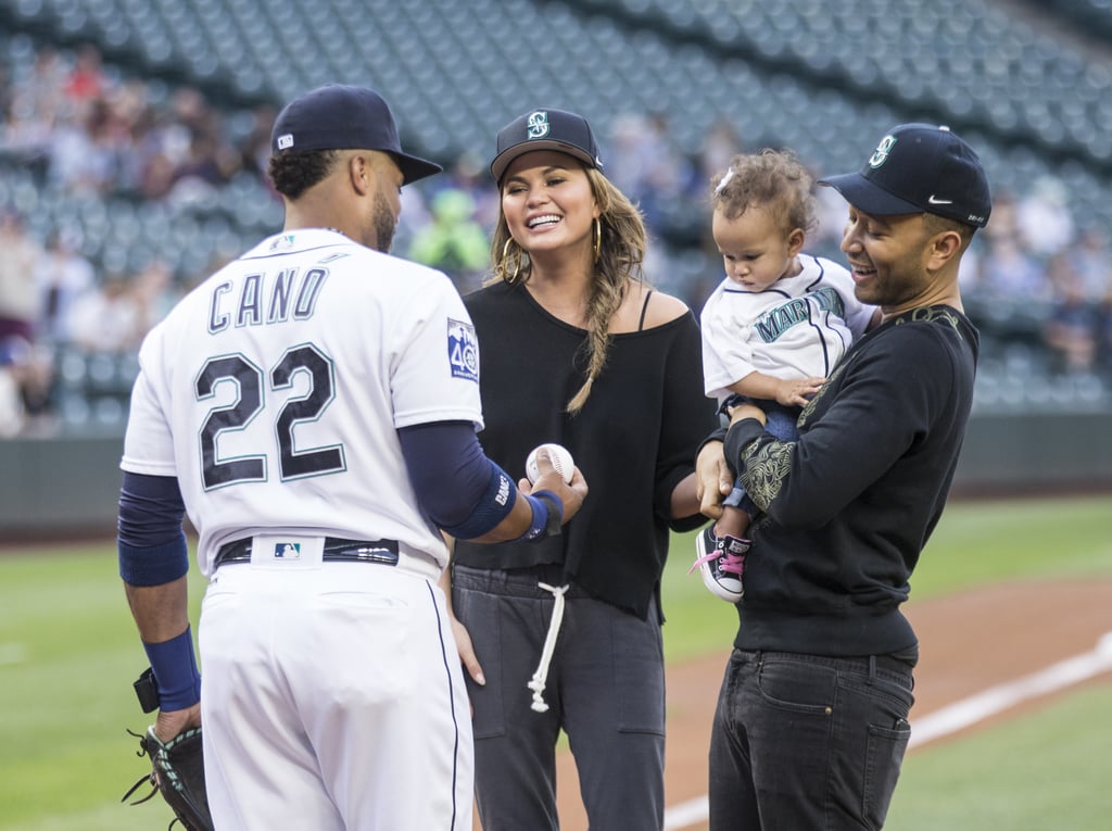 Chrissy Teigen and John Legend With Luna at Mariners Game