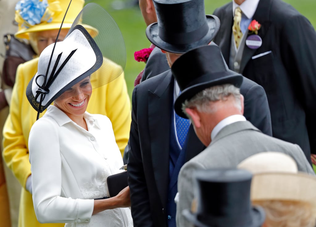 Meghan looked thrilled to see her father-in-law at the Royal Ascot in June 2018.