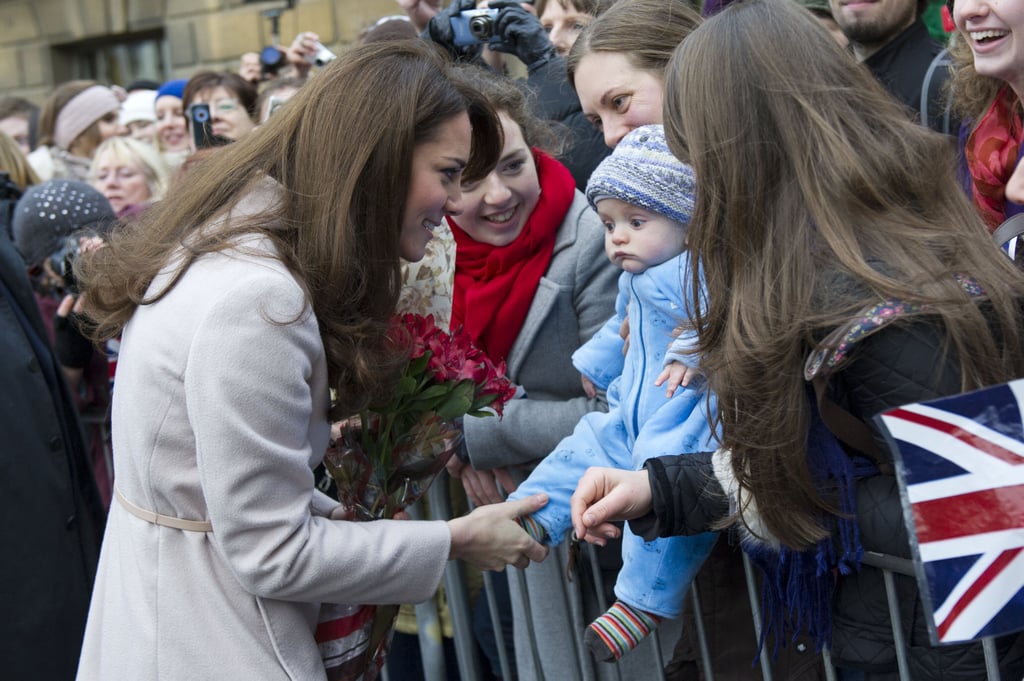 Kate Middleton was still keeping her pregnancy a secret on Nov. 28 when she was joined by Prince William to visit their namesake town, Cambridge.
Kate Middleton was still keeping her pregnancy a secret on Nov. 28 when she was joined by Prince William to visit their namesake town, Cambridge.