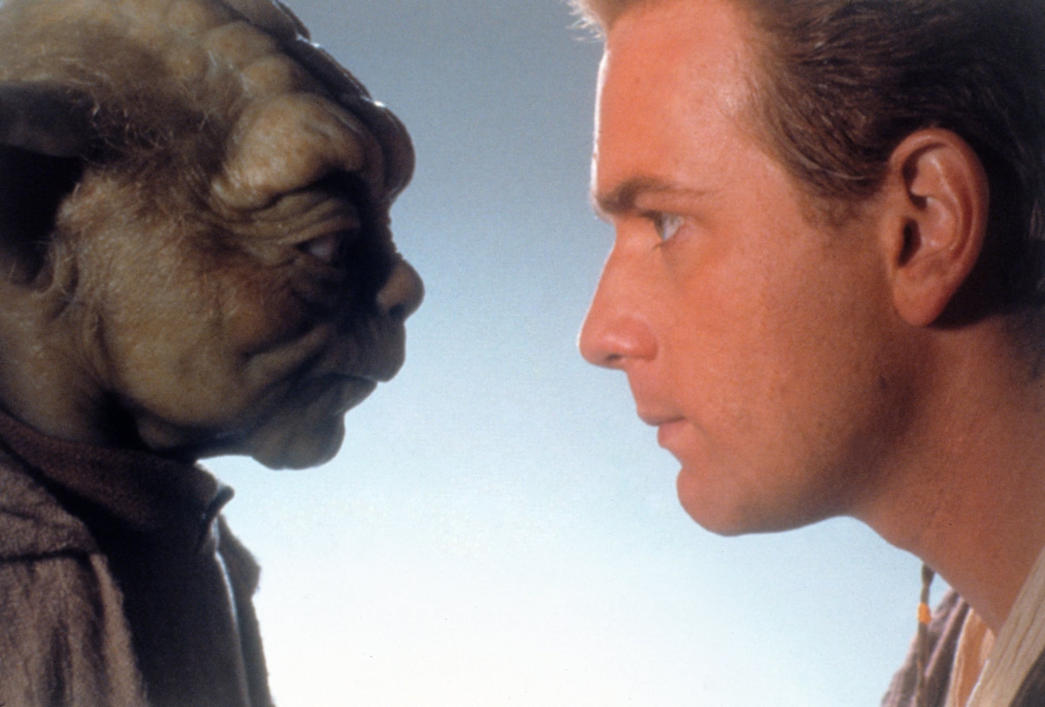 STAR WARS: EPISODE 1-THE PHANTOM MENACE, l-r: Yoda (performed by Frank Oz), Ewan McGregor, 1999. ph: Keith Hamshere/TM and Copyright  20th Century Fox Film Corp. All rights reserved./courtesy Everett Collection