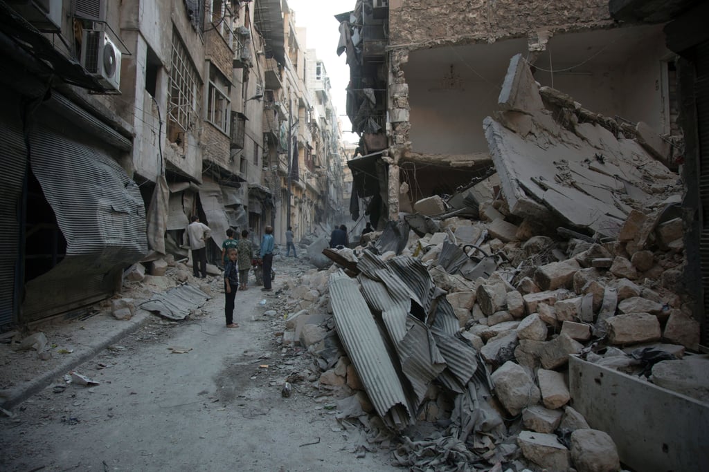 The damage after an airstrike in a rebelheld area of Aleppo. What Is Happening With Syria's