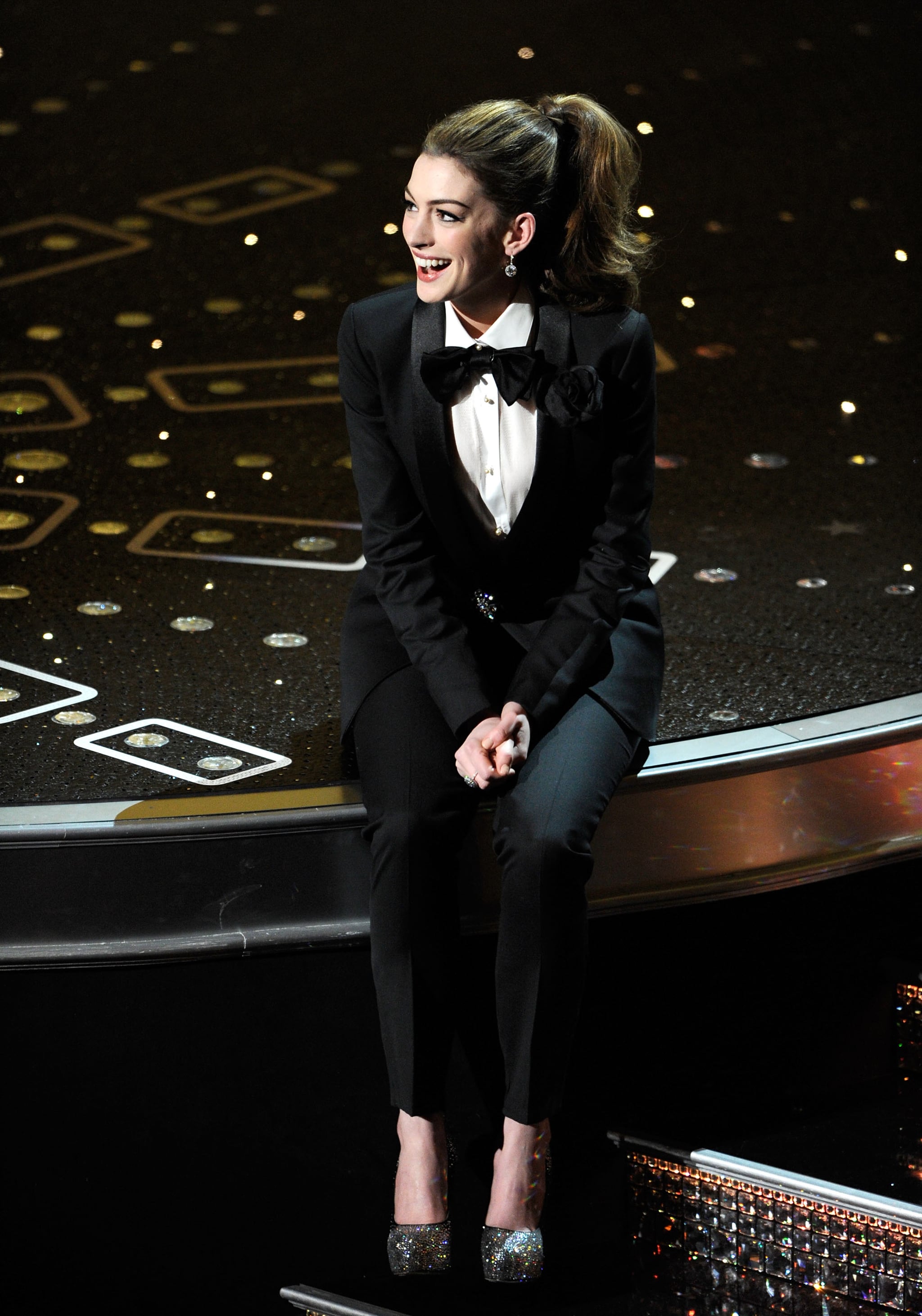 HOLLYWOOD, CA - FEBRUARY 27:  Presenter Anne Hathaway sings onstage during the 83rd Annual Academy Awards held at the Kodak Theatre on February 27, 2011 in Hollywood, California.  (Photo by Michael Caulfield/WireImage)