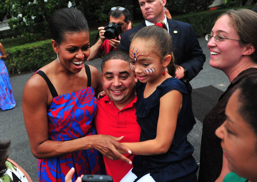 First Lady Michelle Obama hugged it out at a BBQ for White House staff and servicemen and women in 2011.