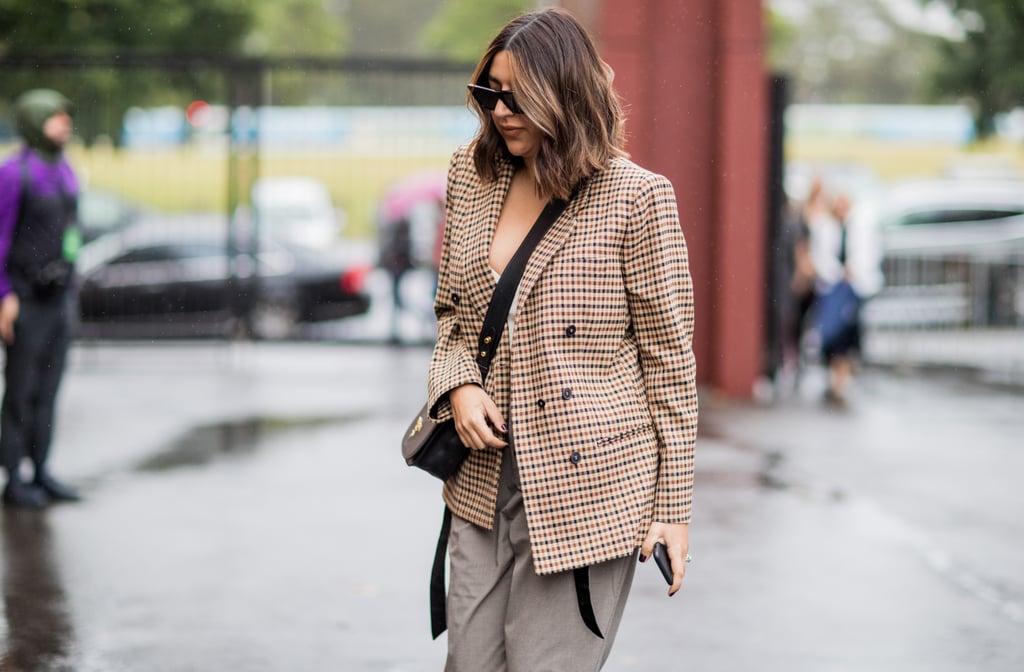 Light brown pants feel cooler with a borrowed-from-the-boys blazer and sharp sunnies.