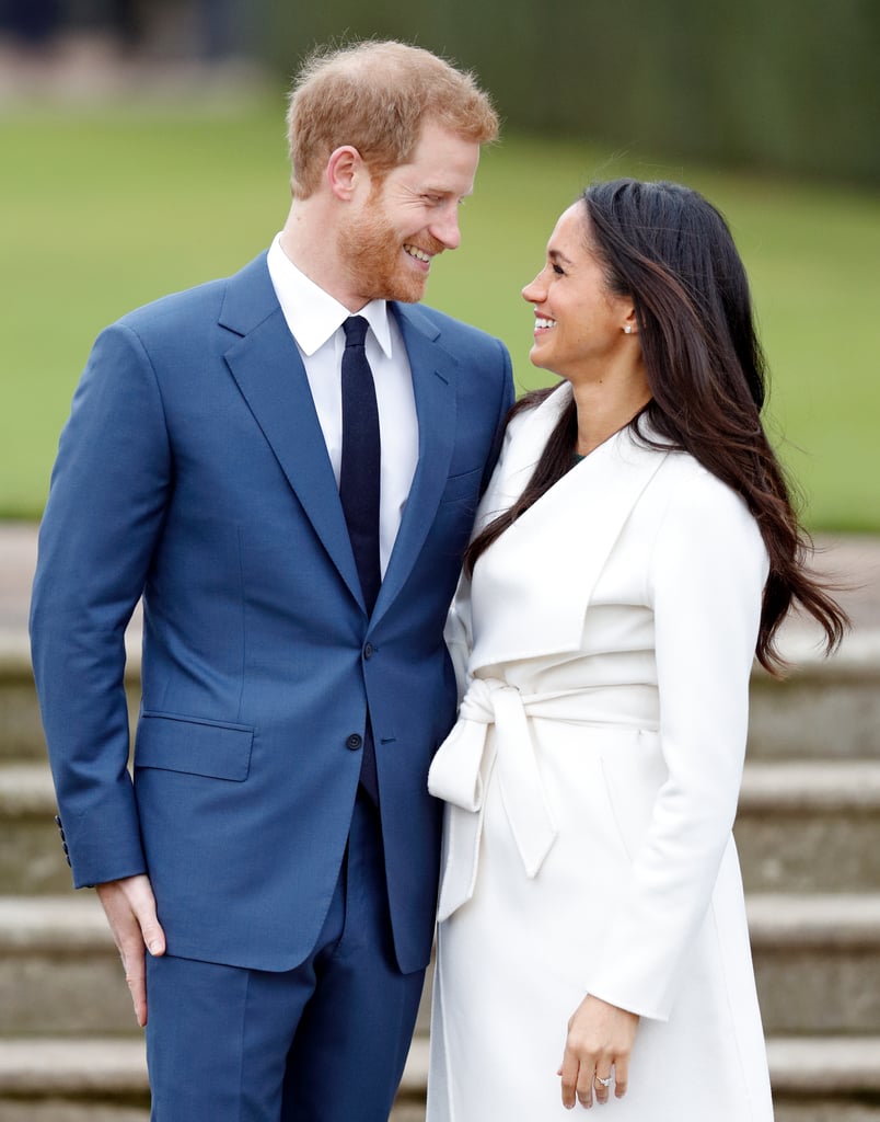 After officially announcing their engagement on Monday morning, Prince Harry and Meghan Markle made a celebratory appearance at Kensington Palace. Harry and Meghan definitely had that newly engaged glow as they held hands and Meghan showed off her stunning engagement ring. In addition to their outing being extra adorable, it instantly reminded us of when the Duke and Duchess of Cambridge stepped out to celebrate their engagement at St. James's Palace back in November 2010. 
While there were many similarities in the way both couples gazed lovingly into each other's eyes and held onto their other halves' arms, there were also a few differences. For starters, Meghan and Harry chose to have their engagement photocall outside at the Sunken Garden and Will and Kate had theirs inside at St. James's Palace. Kate also wore a blue wrap dress for the occasion, while Meghan opted for a white trench coat. And then there are the rings. Kate's engagement ring includes a 12-carat sapphire that once belonged to Princess Diana. Meghan's ring, on the other hand, features a center-stone diamond from Botswana and two smaller diamonds from Harry's personal collection, which was given to him by Diana. Keep reading to see Harry and Meghan's engagement photocall side by side with Will and Kate's.

    Related:

            
            
                                    
                            

            Prince William and Kate Middleton Have the Sweetest Reaction to Harry&apos;s Engagement